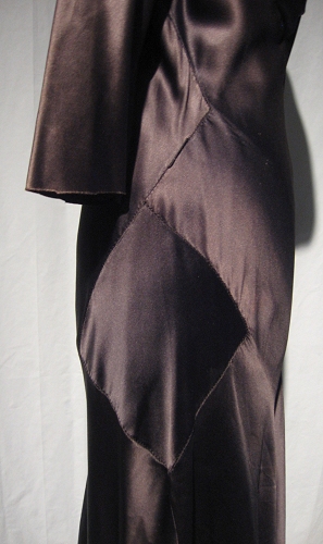 Detail of black silk bias dress.
