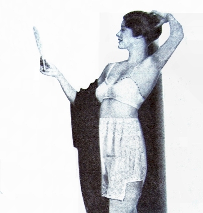 Woman wearing an early "uplift" style bra, in a January 1929 ad for bathroom scales.